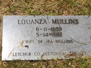 The Letcher County Historical Marker for the Pound Gap Massacre victim Louanza Mullins, wife of Ira Mullins.  The photograph was taken by Joanna Adams Sergent on location.