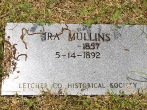 The Letcher County Historical Marker for the Pound Gap Massacre victim Ira Mullins.  The photograph was taken by Joanna Adams Sergent on location.