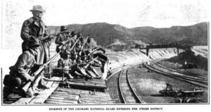 Armed men Colorado National Guard entering into the strike district