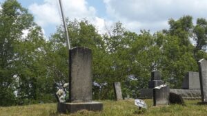 The photograph was taken by Joanna Adams Sergent at the Laurel Branch Cemetery.