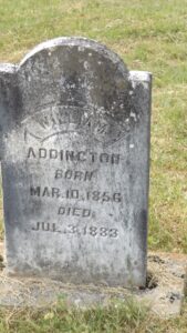 William Addington (March 10, 1856 to July 3, 1883).  The photograph was taken by Joanna Adams Sergent at the Laurel Branch Cemetery
